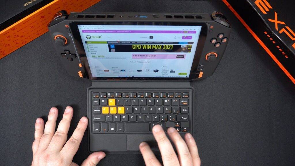 ONEXPLAYER 1S klaviatūra ir delninis kompiuteris