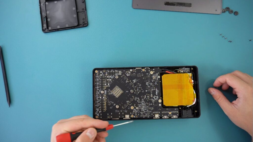 Remove main board screws