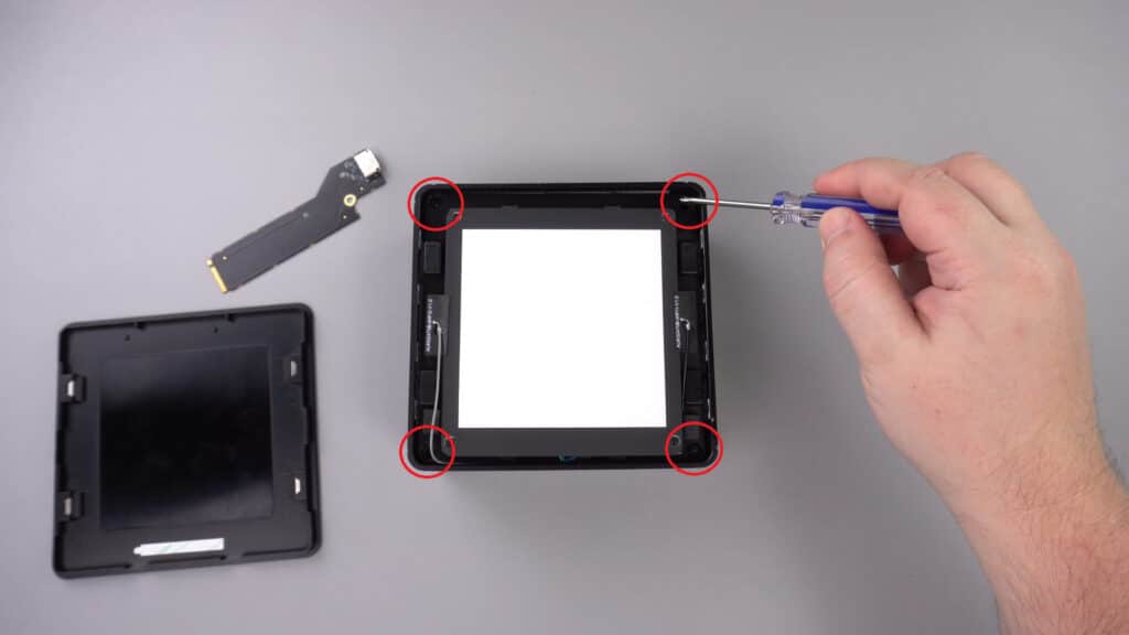 Remove the four screws