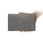 One Netbook Mix 3 Pro Platinum being held in one hand by a person