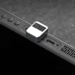Image showing the AYANEO Hola Fingerprint Scanner plugged into an AYA NEO 2021