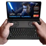 GPD-WIN-MINI-2024-LISTING-NEWEST-DONE-01.32-2 GPD WIN Mini 2024: Powerful handheld gaming PC with 7" FHD 120Hz VRR display. Features AMD Ryzen 7 8840U, 32GB RAM, 2TB NVMe storage. Clamshell design combines full QWERTY keyboard with gaming controls, including dual joysticks and buttons. Compact form factor held comfortably in hands. Screen displays game character with glowing sword, showcasing vibrant graphics. Specs visible: 7" screen, 120Hz VRR, Ryzen 7 8840U, 32GB RAM, 2TB storage. "HANDHELD PC - CLAMSHELL" emphasized. AMD Ryzen and Radeon logos present. Device offers portable gaming and productivity in one, bridging gap between handheld console and mini laptop.