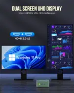 GMKtec mini PC connected to dual HD displays showcasing its capability to support multiple screens simultaneously The setup includes a sleek compact black mini PC unit with HDMI ports used to connect two high definition monitors displaying vibrant crisp visuals
