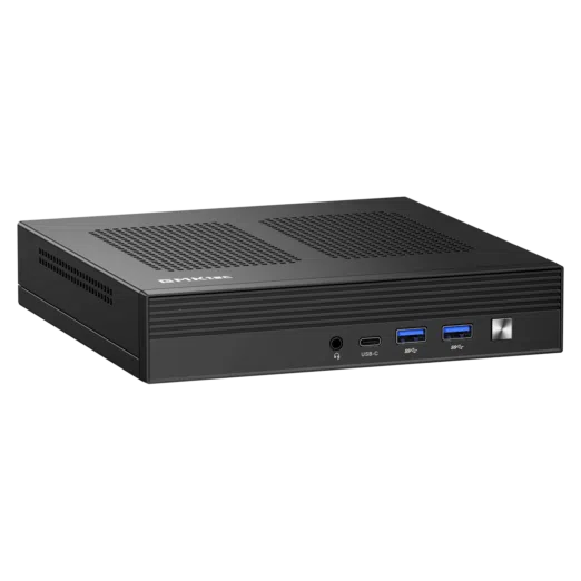 The image shows the GMKTEC NUBOX M4 Mini PC, a compact and stylish computing device. The mini PC has a sleek, matte black finish with a minimalist design. The front panel features multiple input/output ports including USB ports, an audio jack, and possibly a power button. The GMKTEC logo is prominently displayed on the top surface. The device's small form factor highlights its portability and practicality for various computing needs.