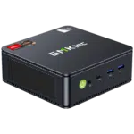 The image showcases the GMKTEC NUBOX M6 Mini PC, a compact computing device designed for versatility and efficiency. With a sleek matte black finish, it exudes a modern aesthetic. Its compact form factor makes it suitable for various computing needs. The GMKTEC logo is subtly displayed on the device, maintaining a minimalist design.