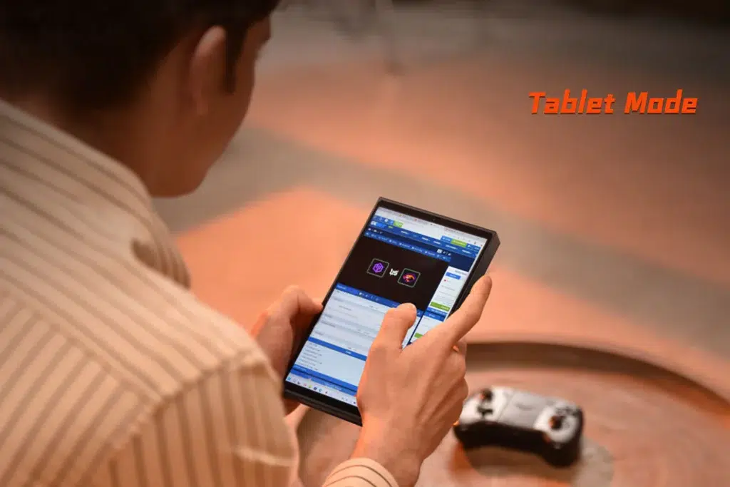 ONEXPLAYER X1 Mini 10 A person holding the ONEXPLAYER X1 Mini in Tablet Mode, browsing applications, emphasizing its touchscreen capabilities and portability.