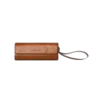 AYANEO-MICRO-PROTECTIVE-LEATHER-CASE AYANEO Micro Protective Leather Case in brown, featuring a compact, cylindrical design with a fold-over flap secured by a magnetic closure. The case has a wrist strap attached for easy carrying, and the 'AYANEO' logo is embossed on the front. Designed to provide stylish and durable protection for AYANEO Pocket Micro devices.
