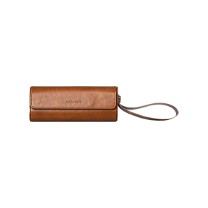 AYANEO Micro Protective Leather Case in brown, featuring a compact, cylindrical design with a fold-over flap secured by a magnetic closure. The case has a wrist strap attached for easy carrying, and the 'AYANEO' logo is embossed on the front. Designed to provide stylish and durable protection for AYANEO Pocket Micro devices.