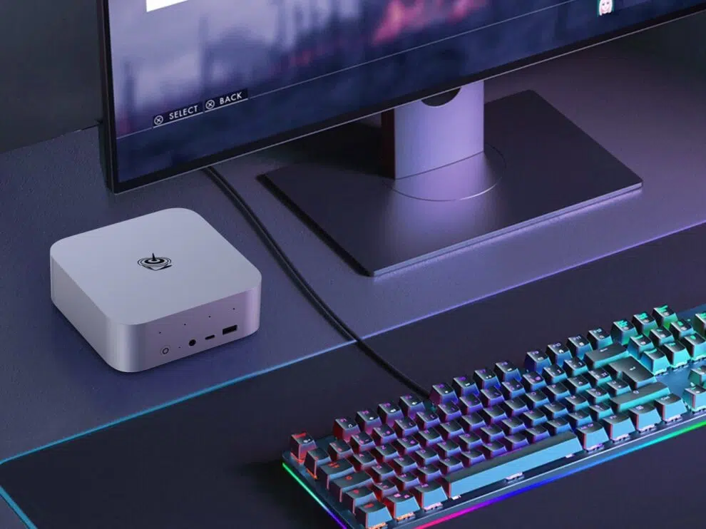 Beelink SER Mini PC showing how small it is next to a monitor and keyboard