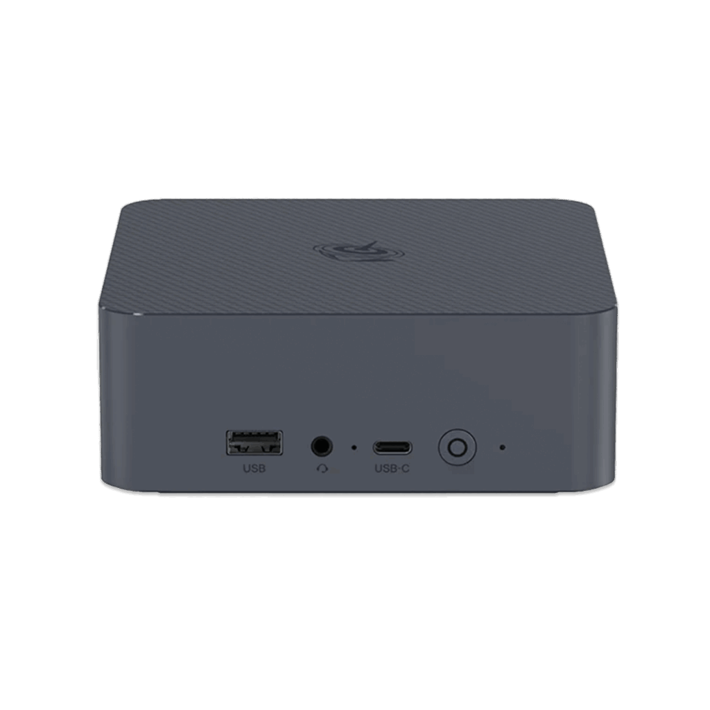 Beelink EQR6 1 A straight-on front view of a dark grey, square-shaped mini PC with rounded corners, set against a solid dark green background. The top surface has a subtle textured pattern and a circular logo. The front panel features a USB-A port, a headphone jack, a USB-C port, and a power button with a circular LED indicator. All ports and buttons are labeled with white text.