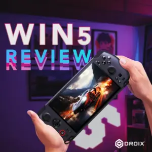 A vibrant thumbnail image for a video review of the GPD WIN 5 handheld gaming console. A pair of hands is holding the black console, which is angled slightly toward the viewer. The screen displays an intense racing game scene with a glowing car. The background is a brightly lit room with purple and neon accents. Large white text with a pink and blue glitch-like effect overlaid on the left side reads "WIN 5 REVIEW." The DROIX logo is in the bottom right corner.