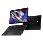 A sleek black portable gaming laptop/tablet hybrid with a detachable RGB-backlit keyboard and a large vibrant display showing a colorful abstract swirl. The device is propped up on a stand, with visible side ports and a modern angular design.
